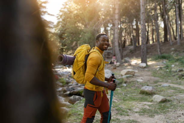 istock happy man hiker in nature adventurous traveler 1432194425