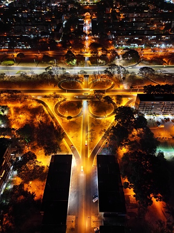 An aerial of a highway intersection in the city of Brasilia during nighttime