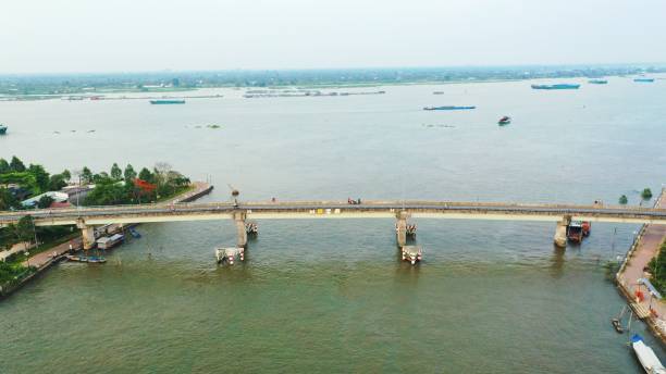 istock Aerial view of a bridge over a river on a bright sunny day 1432197286