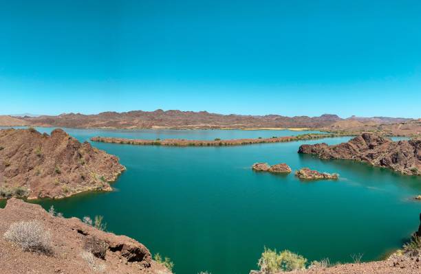 istock Landscape with mountains surrounded by a sea on a sunny day 1432198003