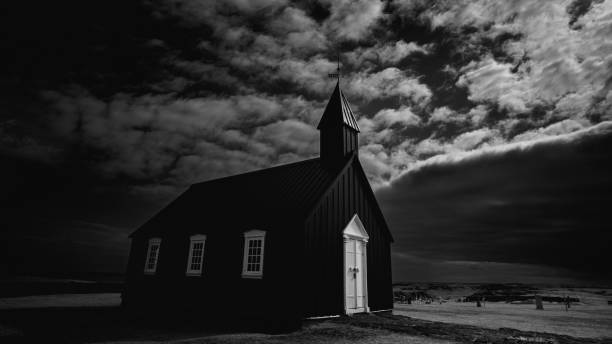 istock Dramatic grayscale shot of a chapel under a cloudy sky 1432198204