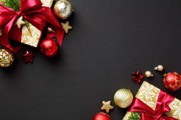 istock Black Christmas background with gift boxes, luxury Xmas decorations, golden and red baubles. Happy New Year banner, Christmas cover, poster design. Flat lay, top view, copy space 1432200963