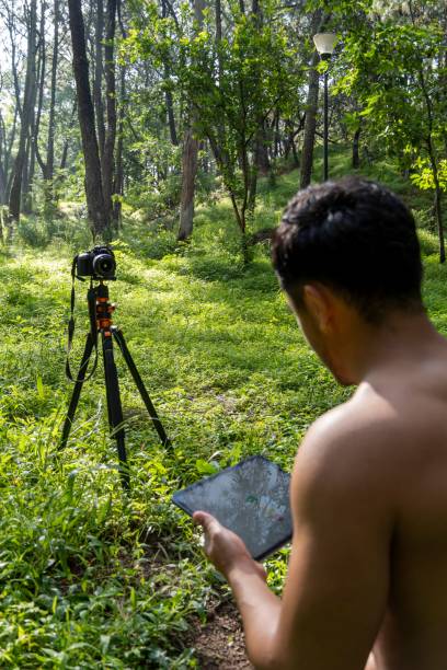 istock Young man drawing on his tablet, while teaching chakra, yoga, and meditation class 1432203622