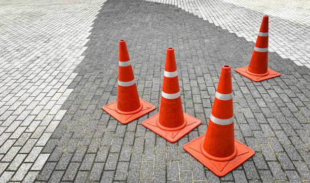 istock Traffic cones lined up on the sidewalk. 1432206587