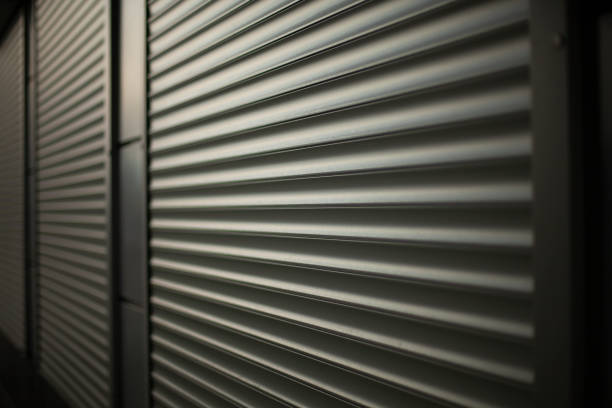 istock Closed shop. Steel blinds. Blinds on office windows. 1432206691