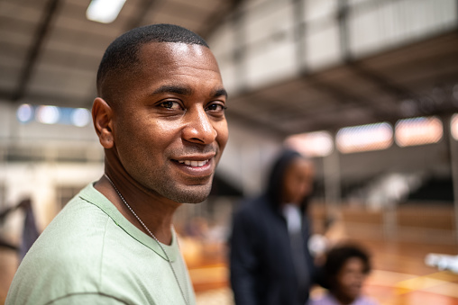 Portrait of a male volunteer at a community center