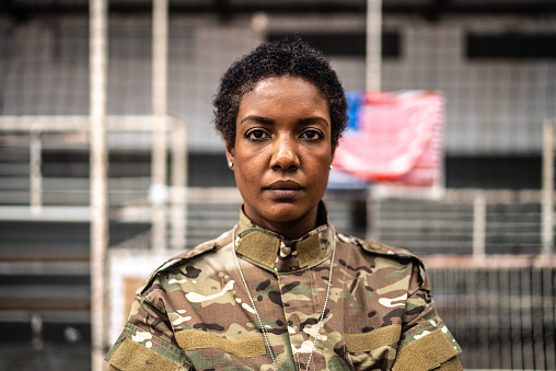 Portrait of a female soldier at a gymnasium