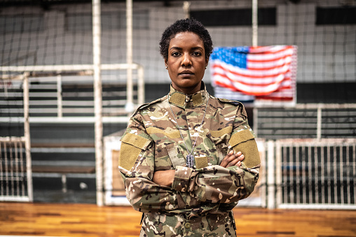 Portrait of a female soldier at a gymnasium