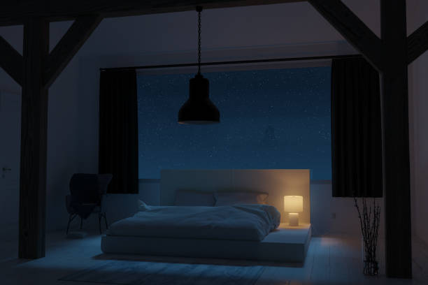 istock 3D rendering of bedroom at attic with cozy low bed at night 1432210077