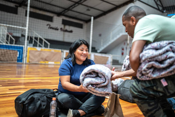 istock Woman receiving a donation in a sheltering 1432210348