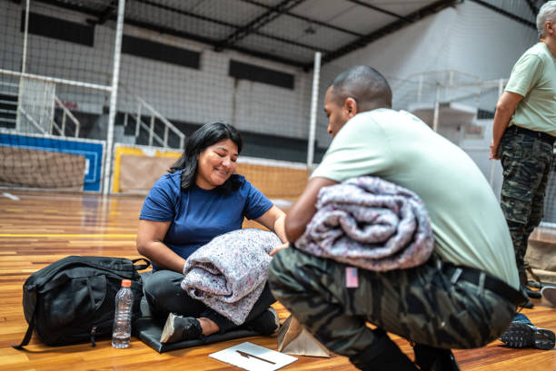 istock Woman receiving a donation in a sheltering 1432210355