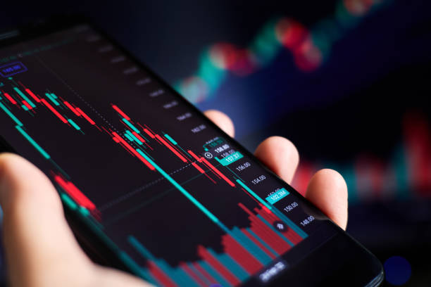 istock Trader analyzes stock market data in smartphone 1432210382
