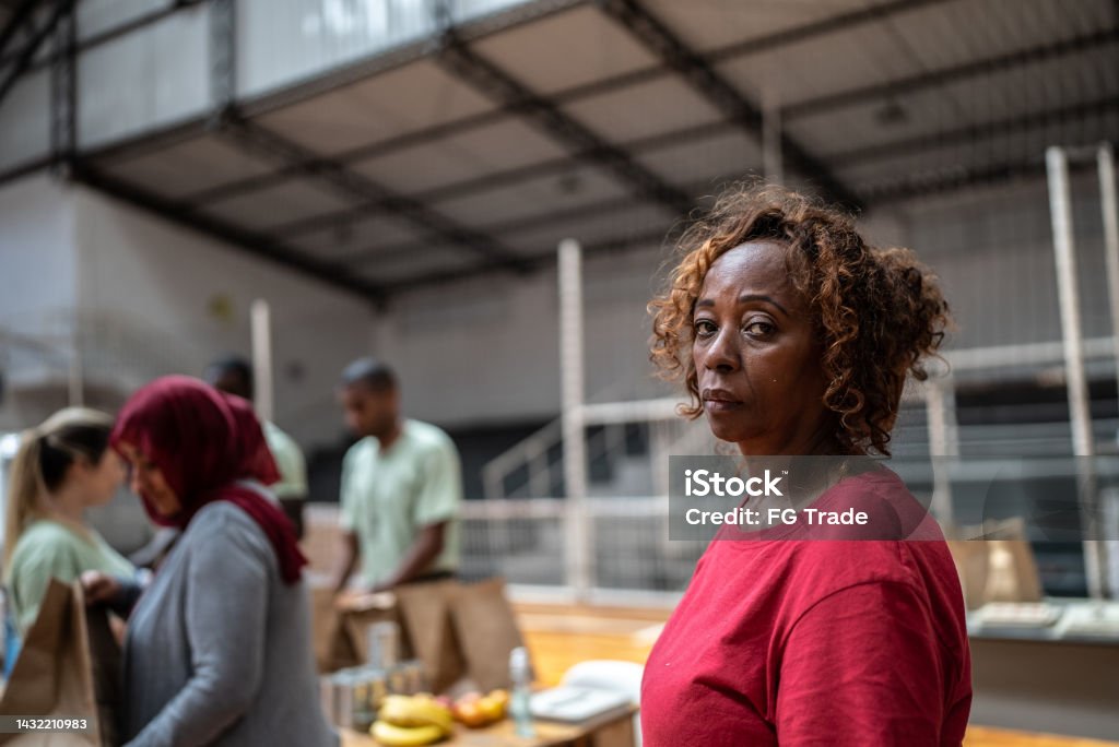 Portrait of a refugee woman in a sheltering Homeless Person Stock Photo