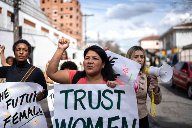 istock Women protesting in the street 1432211922