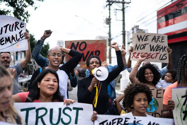istock People protesting in the street 1432211935