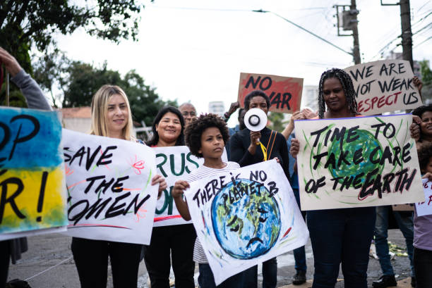 istock Women protesting in the street 1432211936