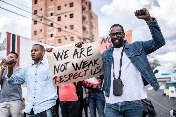istock People protesting in the street 1432211944