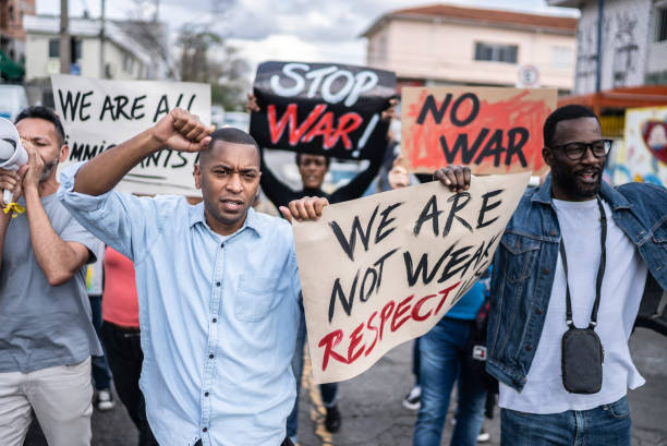 istock People protesting in the street 1432211951