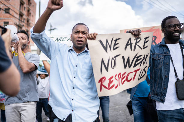 istock People protesting in the street 1432211966