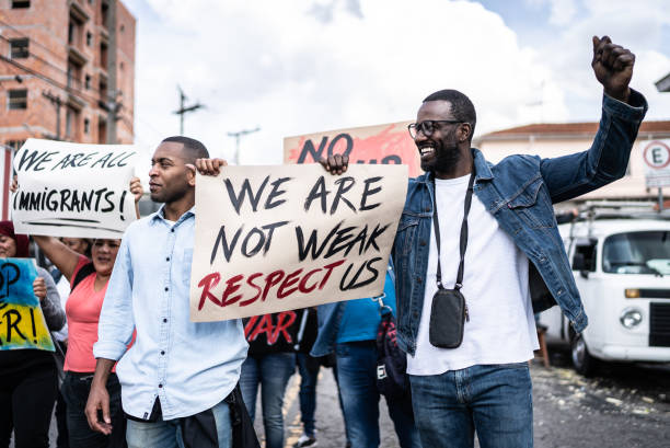istock People protesting in the street 1432211997
