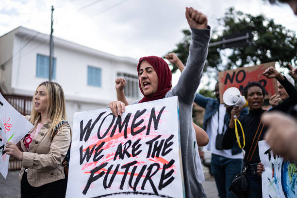 istock People protesting in the street 1432211998