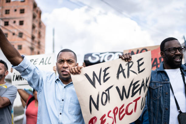 istock People protesting in the street 1432212047
