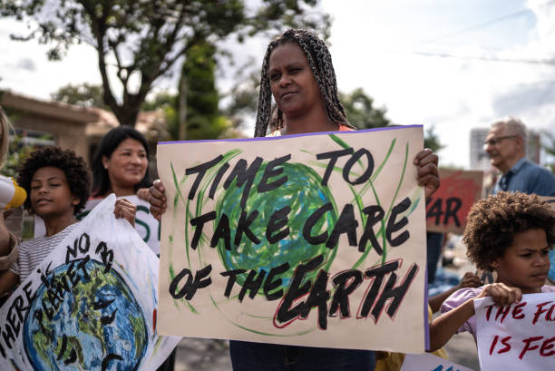istock Mature woman protesting in the street 1432212075