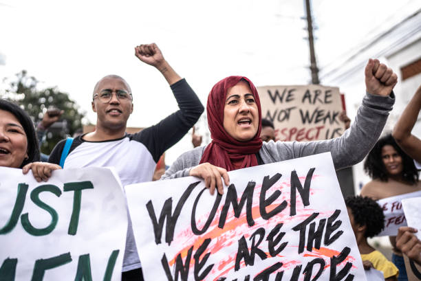 istock People protesting in the street 1432212141