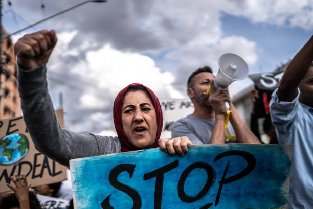 People protesting in the street People protesting in the street palestinian territories stock pictures, royalty-free photos & images