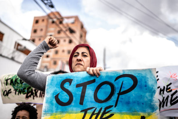 istock Mature woman protesting in the street 1432212201