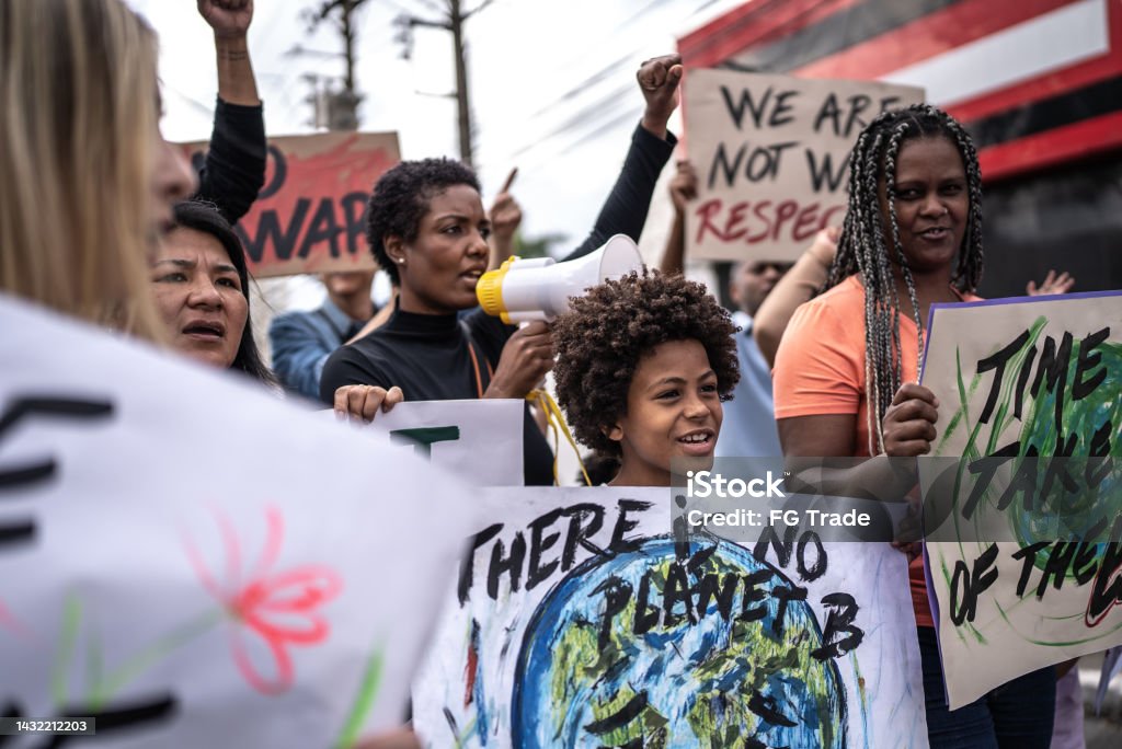 People protesting in the street Climate Activist Stock Photo