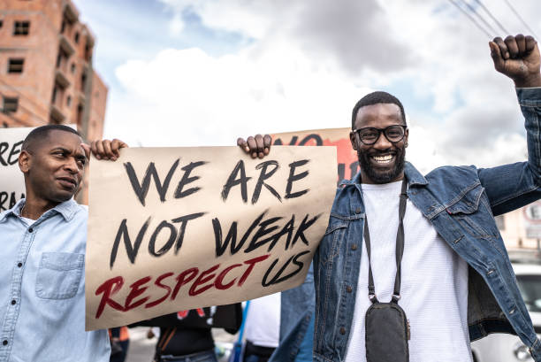 istock People protesting in the street 1432212288
