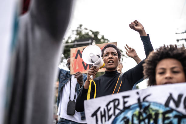 istock People protesting in the street 1432212300