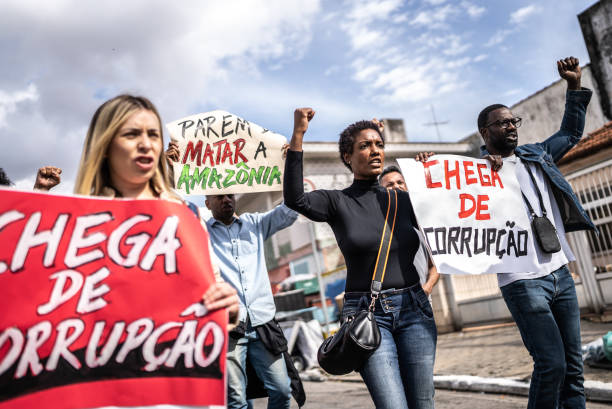 Brazilian people protesting against corruption outdoors