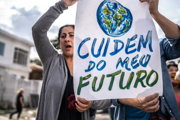 istock Brazilian environmentalists protesting about planet earth outdoors 1432213244