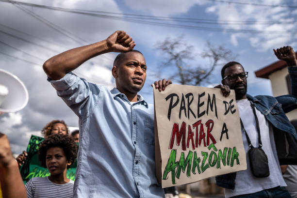 istock Brazilian environmentalists protesting about Amazon outdoors 1432213264