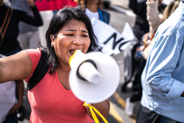 Buenos Aires, Argentina - November 18, 2010: Madres de la Plaza de Mayo (Mothers of Mayo Square) on their weekly march, protesting for their disappeared children during the Dirty War of the Argentine military dictatorship (1976-83)