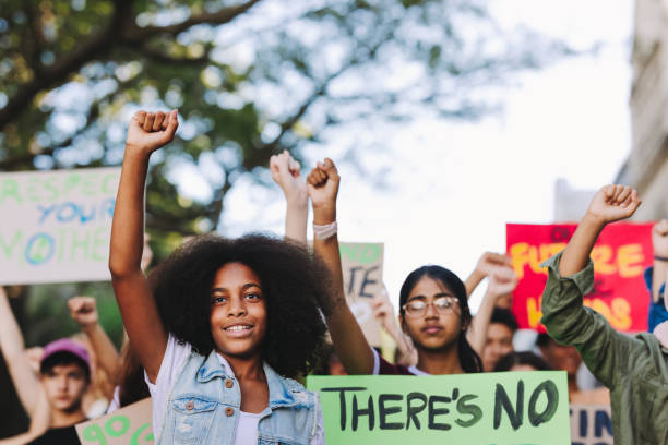 istock Teenagers standing up against climate change 1432214071