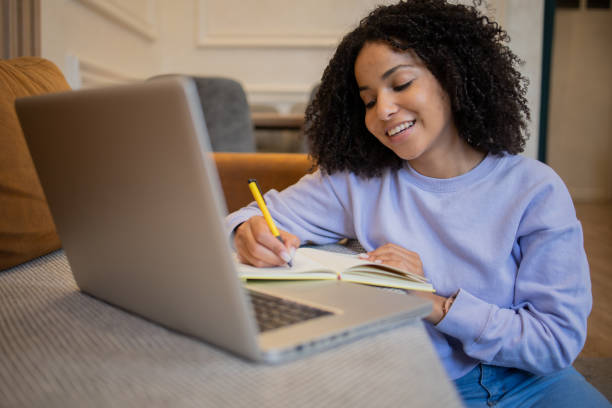 istock Young woman working from home 1432220463