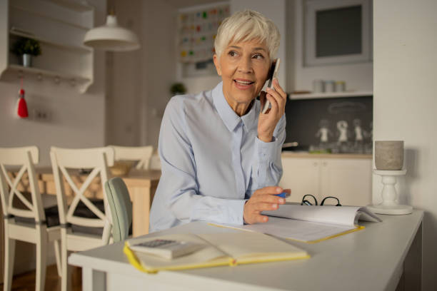 istock Senior woman working from home 1432220865