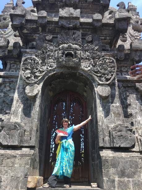 istock A caucasian female posing in front of a temple gate 1432227180