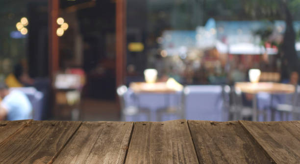 istock Wood top table with Blur coffee shop or cafe restaurant.copy space 1432228153