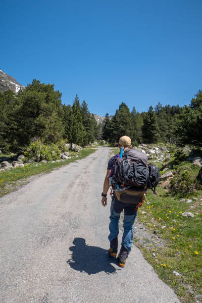 istock Young man hiking in the Pyrenees, Spain 1432228279