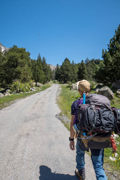 istock Young man hiking in the Pyrenees, Spain 1432228762
