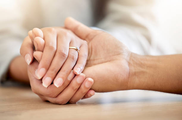 istock Married couple hands for loving trust and empathy or support. Husband being understanding for wife infertility show love, help or hope. Man feeling compassion, kindness and affection for partner. 1432230041