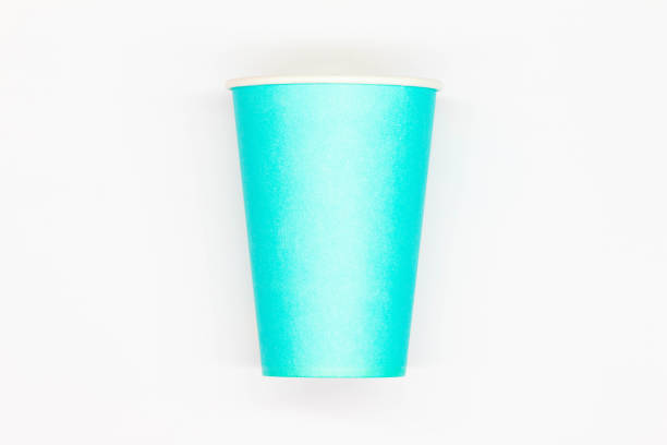 istock Paper coffee cup. Blue craft paper coffee cup without lid. Disposable cup for safe drinking of hot and cold drinks. Safe ribbed capacity. Container for healthy beverage. Isolated. Close-up 1432238766