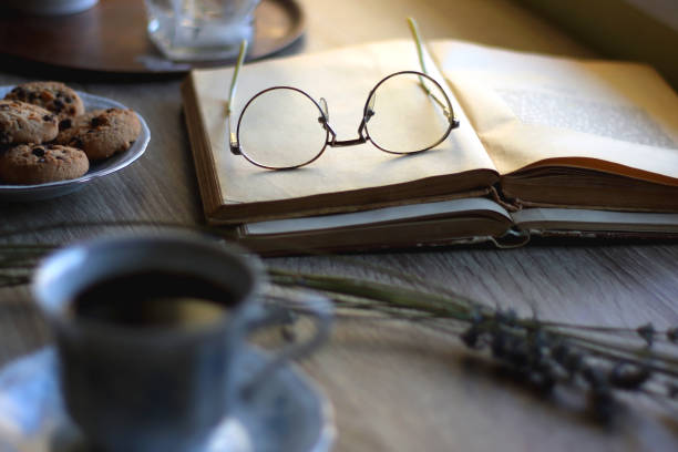 istock Tea, Cookies, Book, Candles and Lavender 1432239306