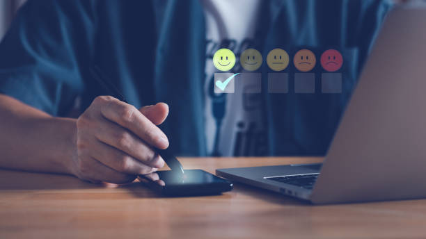 istock Customer satisfaction score feedback in smart phone with digital pen. 1432242127