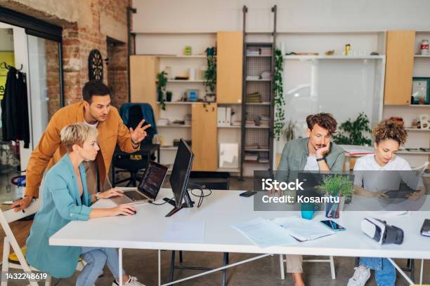 A Small Group Of Diverse Students Learn Coding Techniques And How To ...