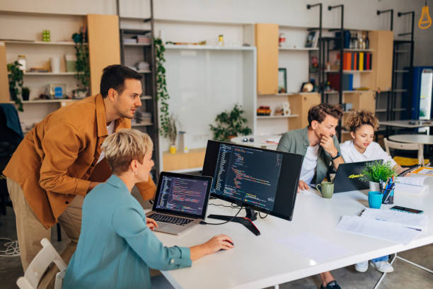 istock A small group of colleagues is in the office. They learn coding in pairs 1432248842